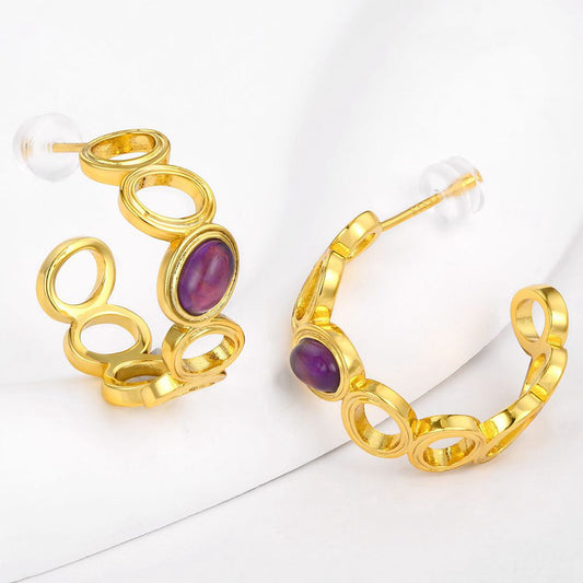 Ohrringe aus goldplattierter Legierung mit purpurfarbenem Emporia® Kristall