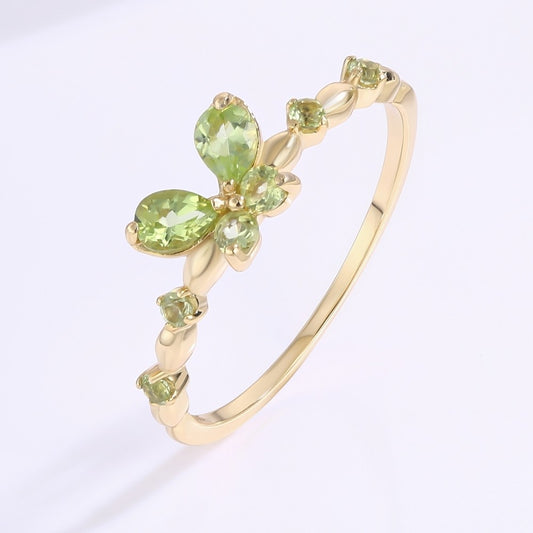 Ring aus goldplattierter Legierung mit grünem Emporia® Kristall