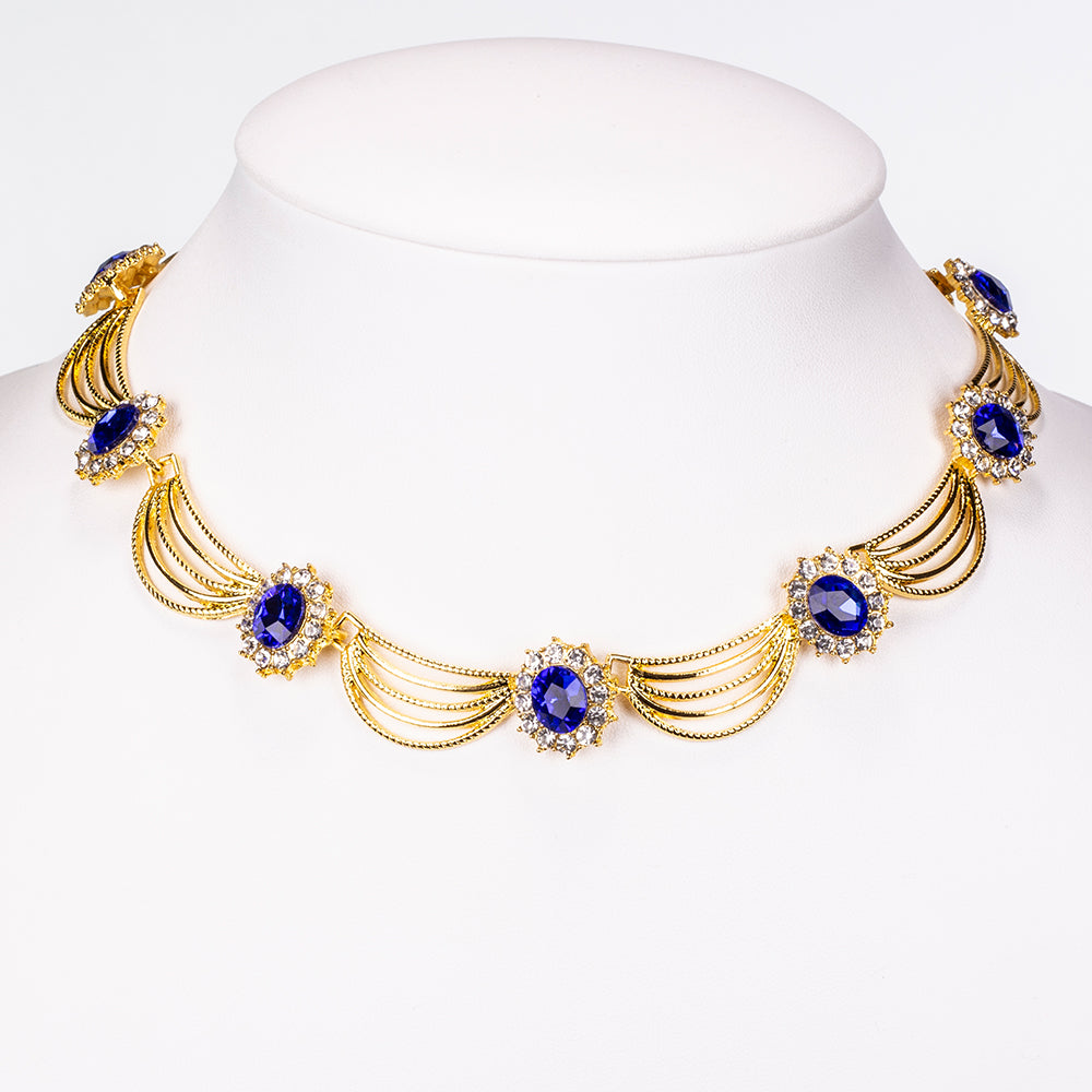 Schmuckgarnitur aus aus goldplattierter Legierung mit blauem Emporia®-Kristall und weißem Emporia® Kristall