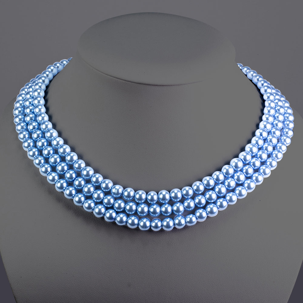 Schmuckgarnitur aus aus goldplattierter Legierung mit Glasperle