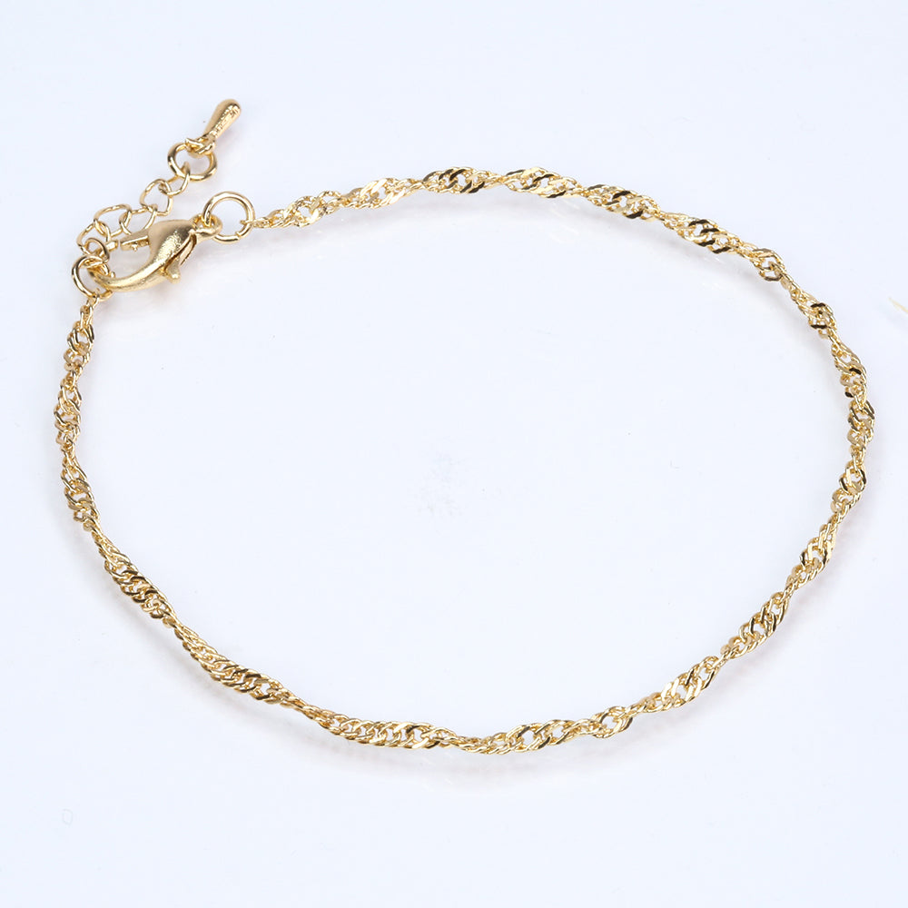 Schmuckgarnitur aus aus goldplattierter Legierung mit Glasperle