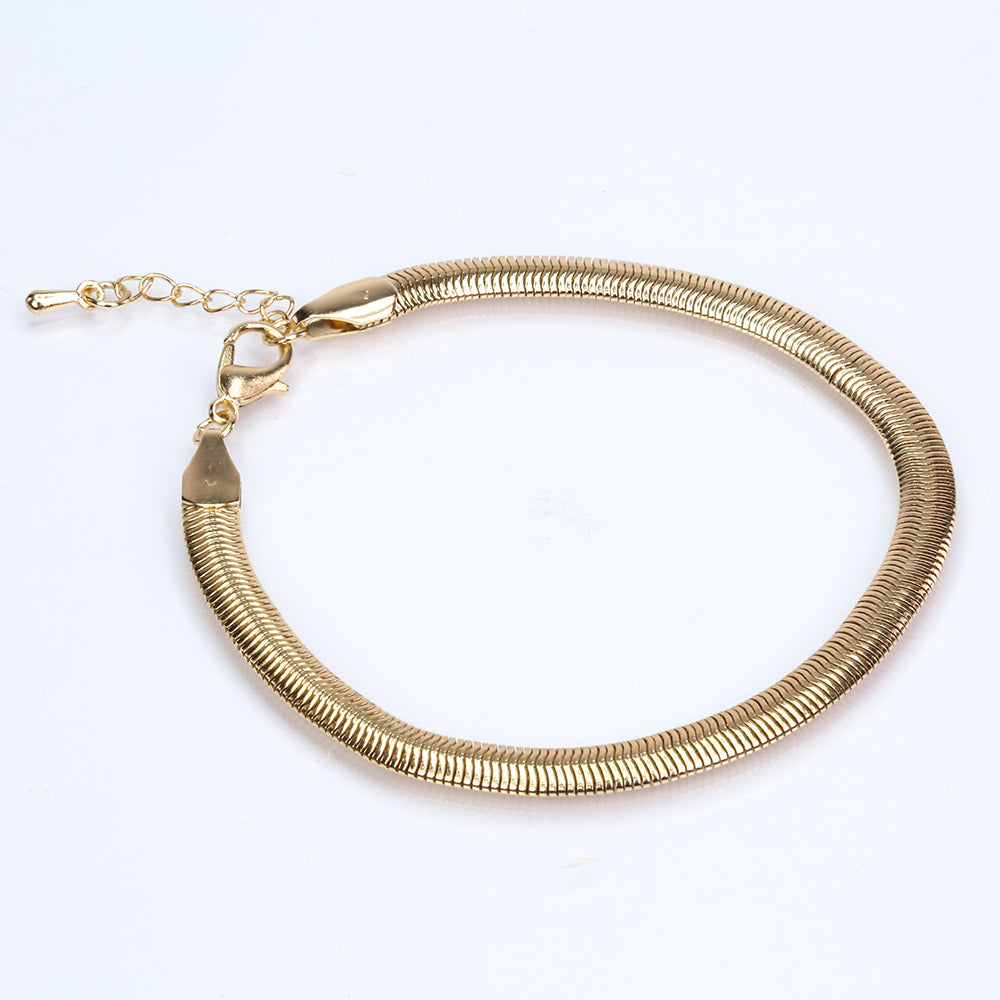 Schmuckgarnitur aus aus goldplattierter Legierung mit Glasperle
