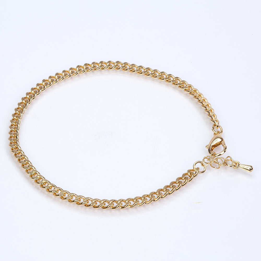 Schmuckgarnitur aus aus goldplattierter Legierung mit Glasperle