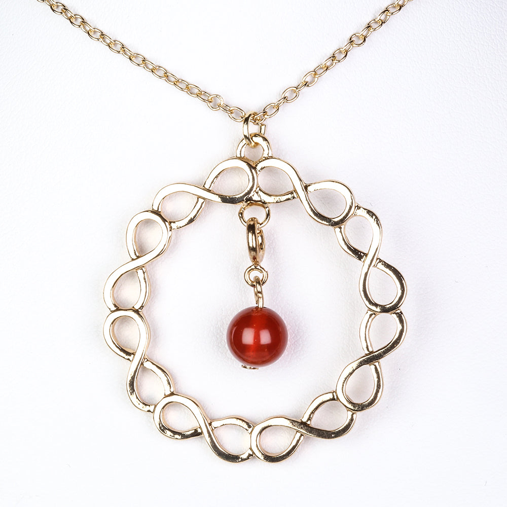 Schmuckgarnitur aus aus goldplattierter Legierung mit rotem Achat und Amethyst