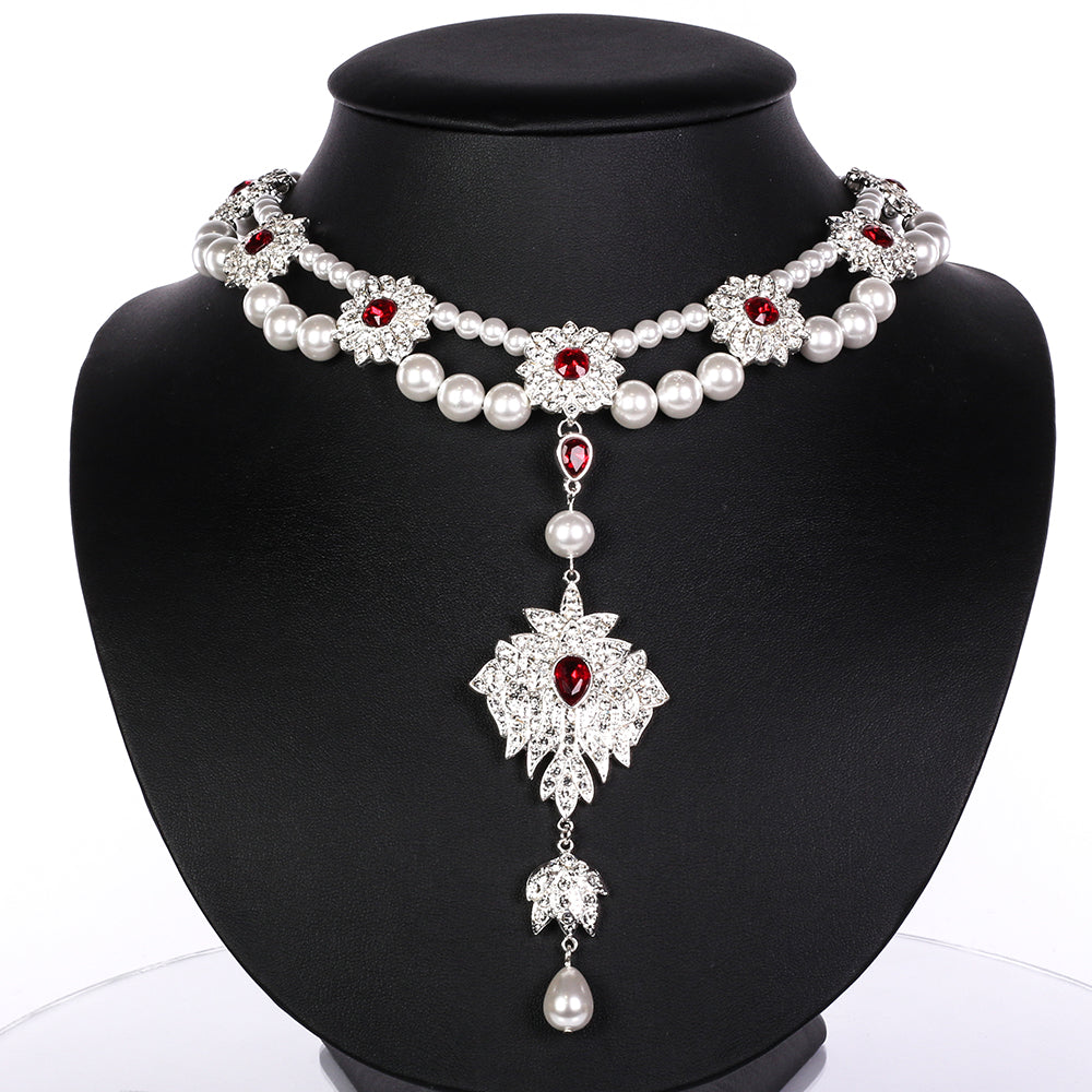 Schmuckgarnitur aus aus goldplattierter Legierung mit Glasperle und weißem Emporia® Kristall