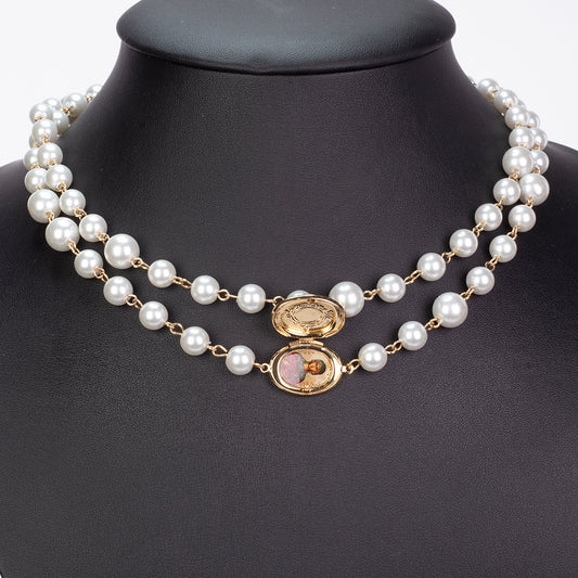 Halskette aus goldplattierter Legierung mit Glasperle