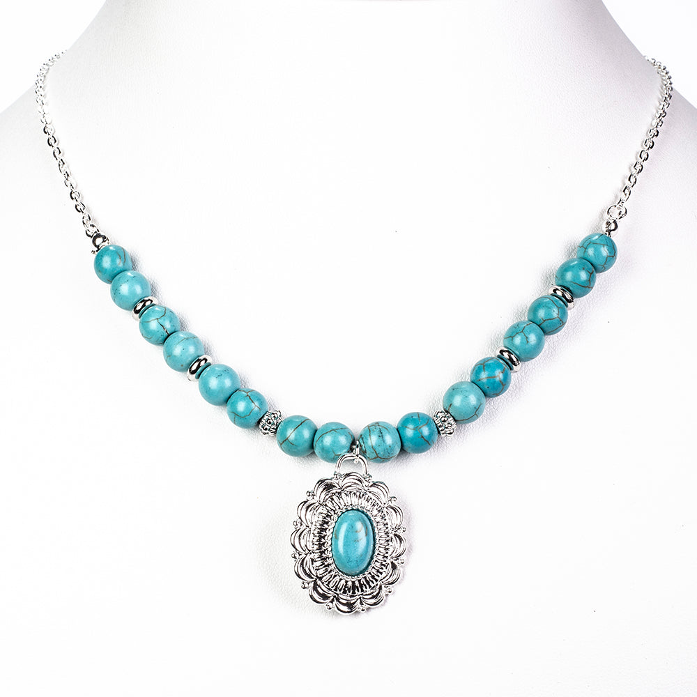 Schmuckgarnitur aus aus goldplattierter Legierung mit Türkis