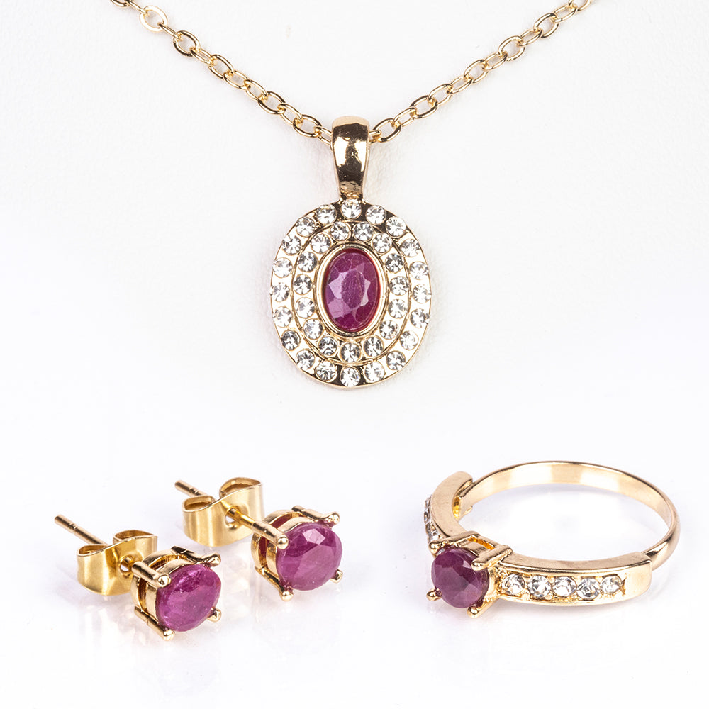 Schmuckgarnitur aus aus goldplattierter Legierung mit Rubin und weißem Emporia® Kristall