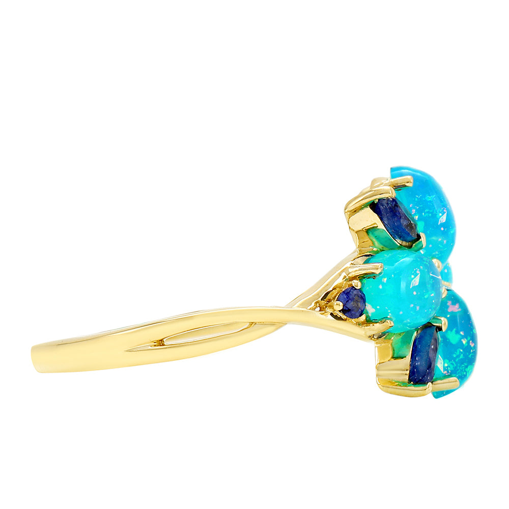 Goldring mit äthiopischem Paraiba-Blauopal und blauem Saphir