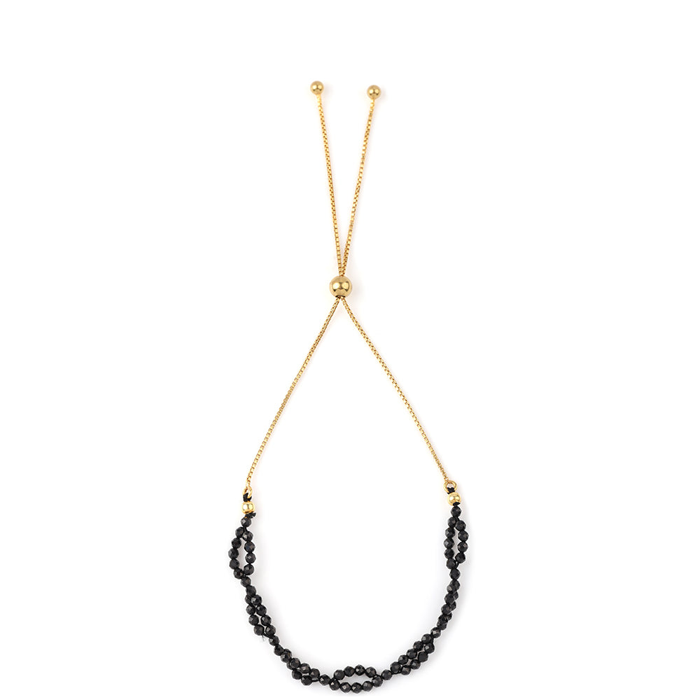 Goldplattiertes Silberarmband mit schwarzem Spinell