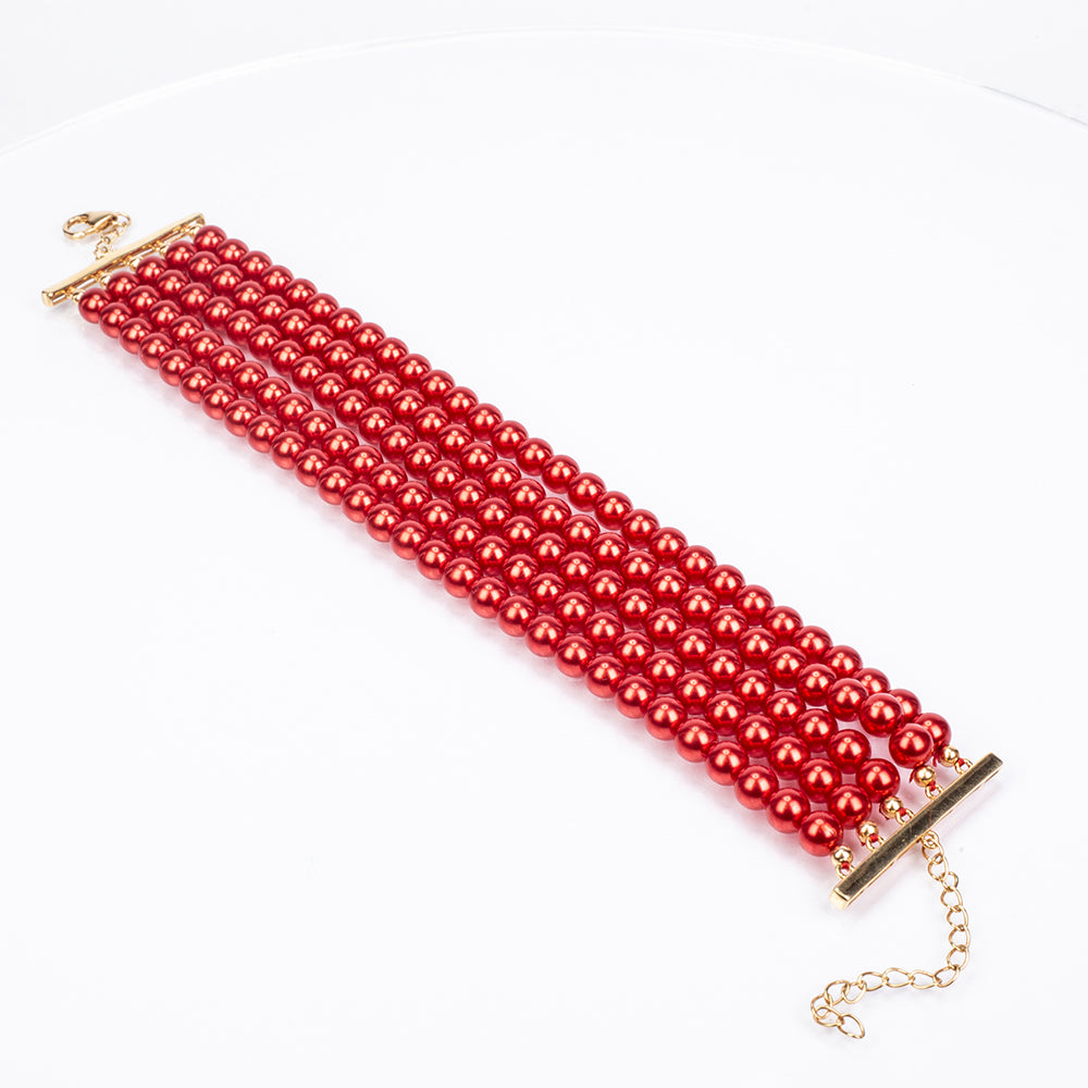 Goldplattiertes Silberarmband mit roter Süßwasserperle