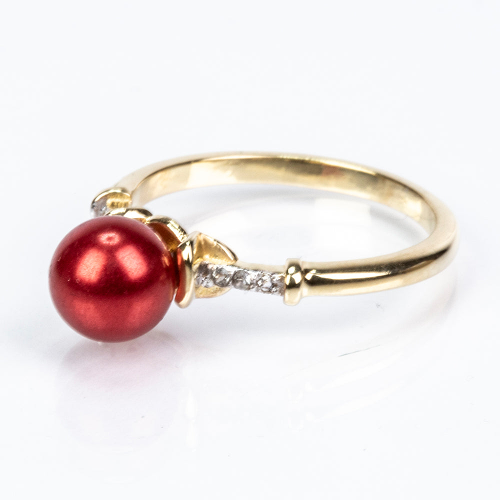 Goldplattierter Silberring mit roter Süßwasserperle und weißem Topas