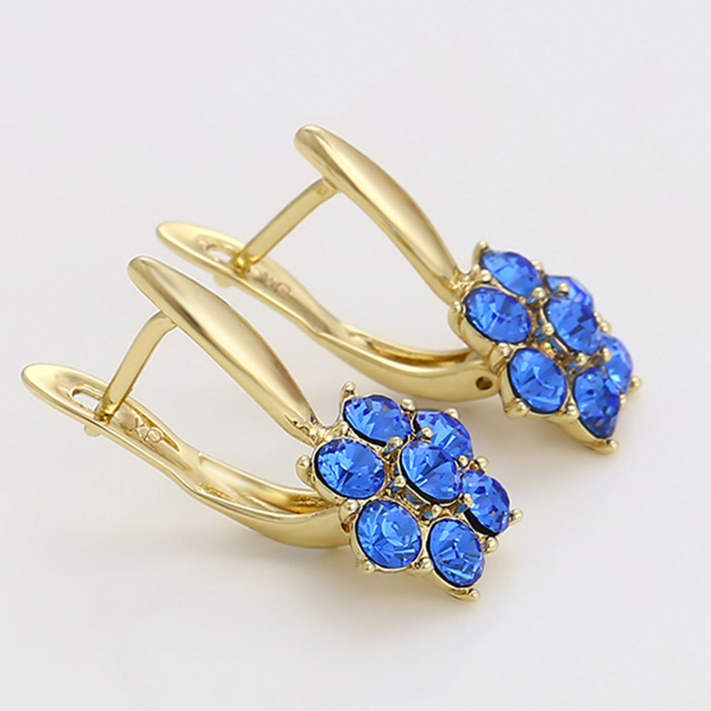 Ohrringe aus goldplattierter Legierung mit blauem Emporia®-Kristall