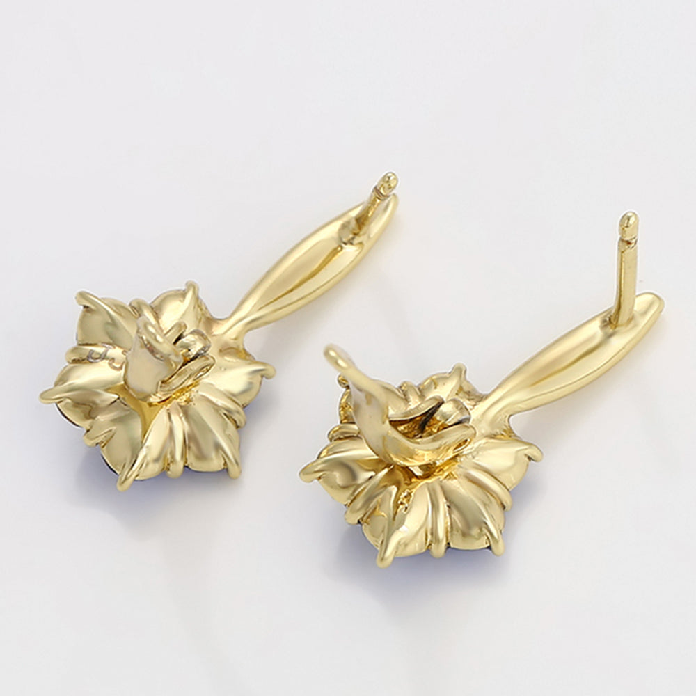 Ohrringe aus goldplattierter Legierung mit blauem Emporia®-Kristall