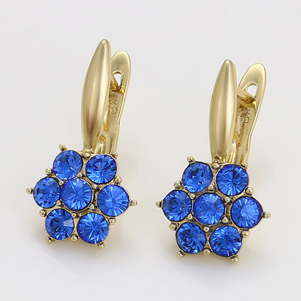 Ohrringe aus goldplattierter Legierung mit blauem Emporia®-Kristall