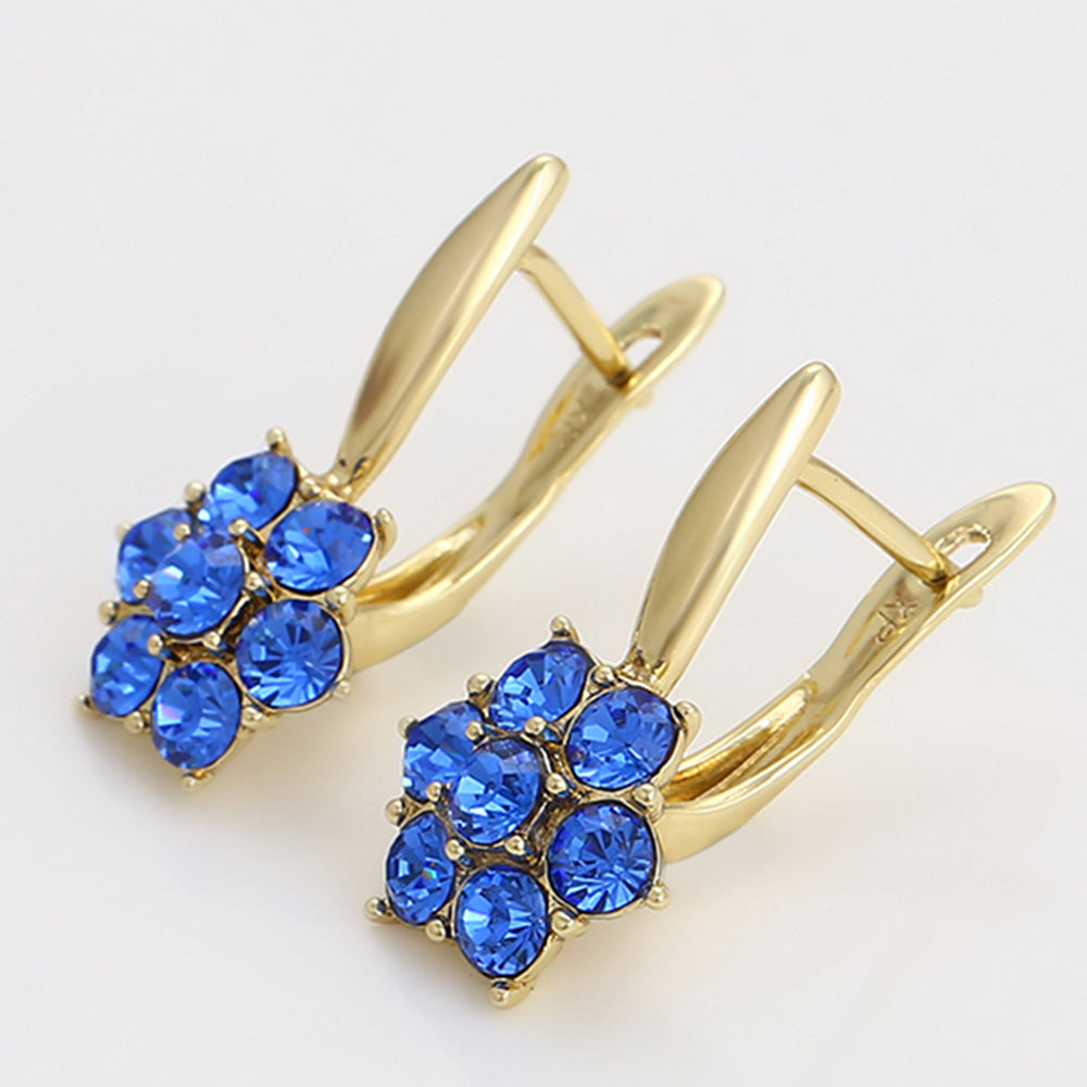Ohrringe aus goldplattierter Legierung mit blauem Emporia®-Kristall