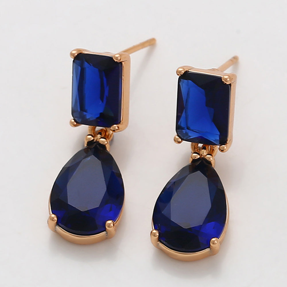 Ohrringe aus goldplattierter Legierung mit blauem Emporia®-Kristall