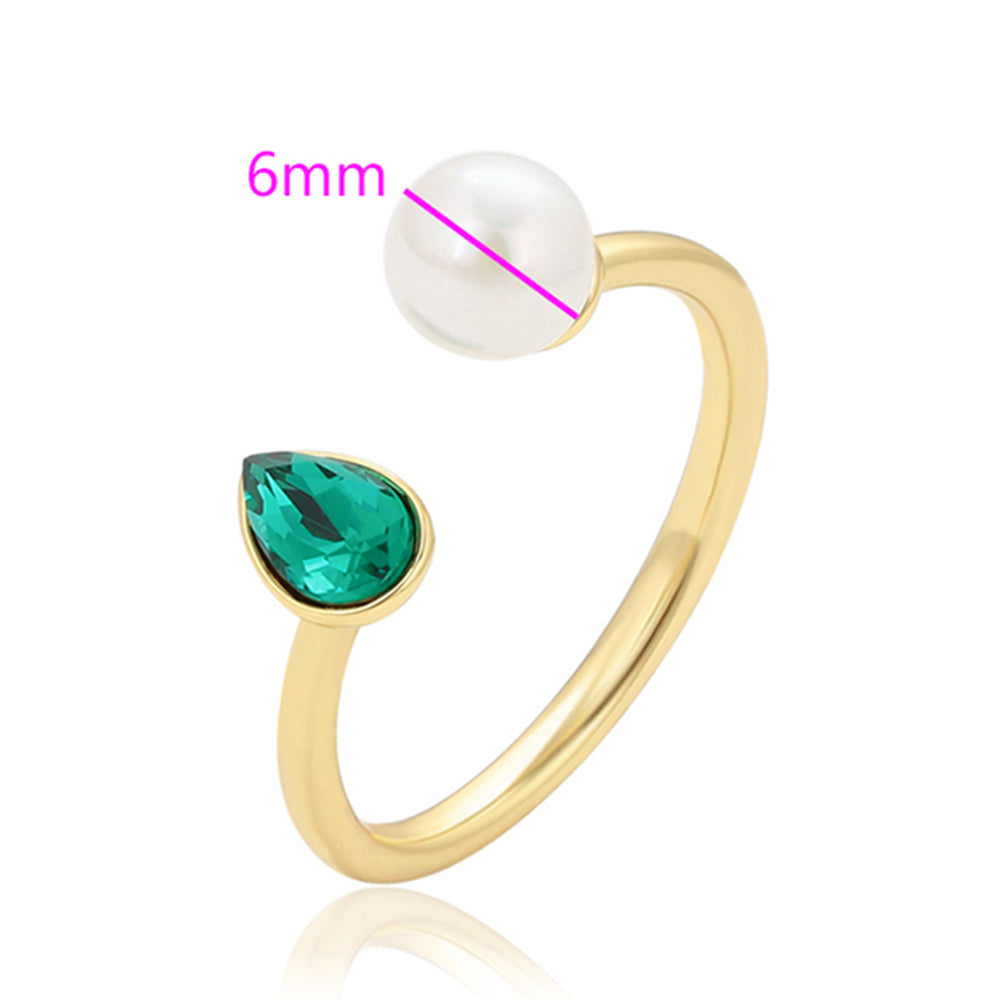 Ring aus goldplattierterr Legierung mit Glasperle und grünem Emporia® Kristall