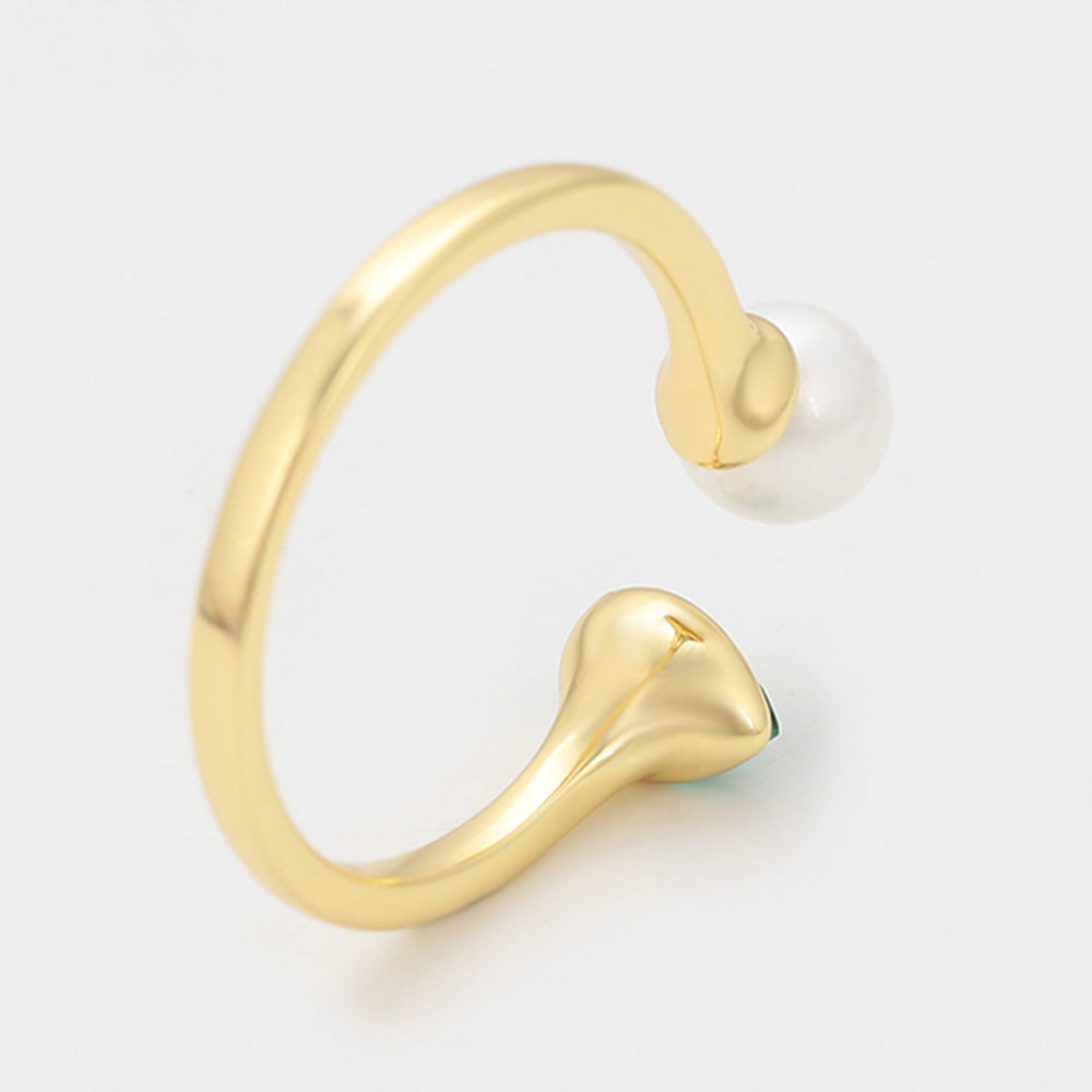 Ring aus goldplattierterr Legierung mit Glasperle und grünem Emporia® Kristall