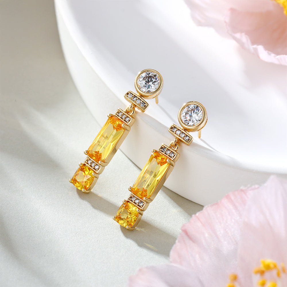 Ohrringe aus goldplattierter Legierung mit gelbem Emporia®-Kristall und weißem Emporia® Kristall 1