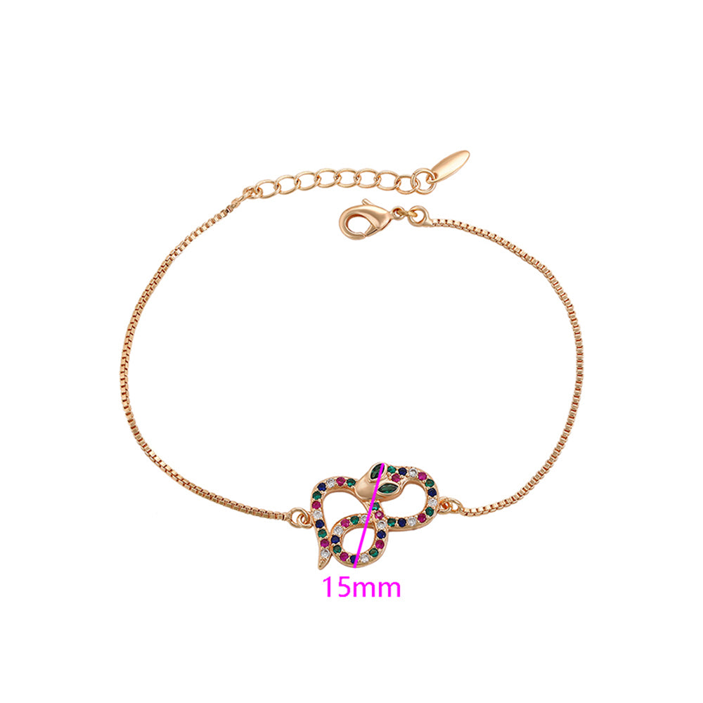 Armband aus goldplattiertesr Legierung mit rotem Emporia®-Kristall und grünem Emporia® Kristall