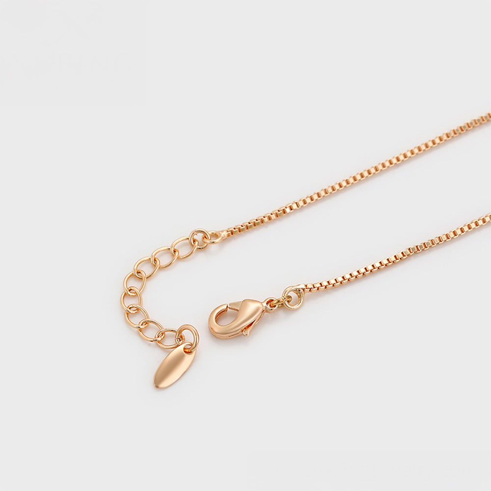 Armband aus goldplattiertesr Legierung mit rotem Emporia®-Kristall und grünem Emporia® Kristall