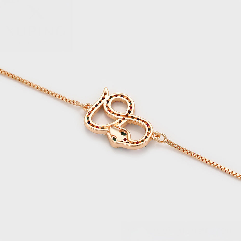 Armband aus goldplattiertesr Legierung mit rotem Emporia®-Kristall und grünem Emporia® Kristall