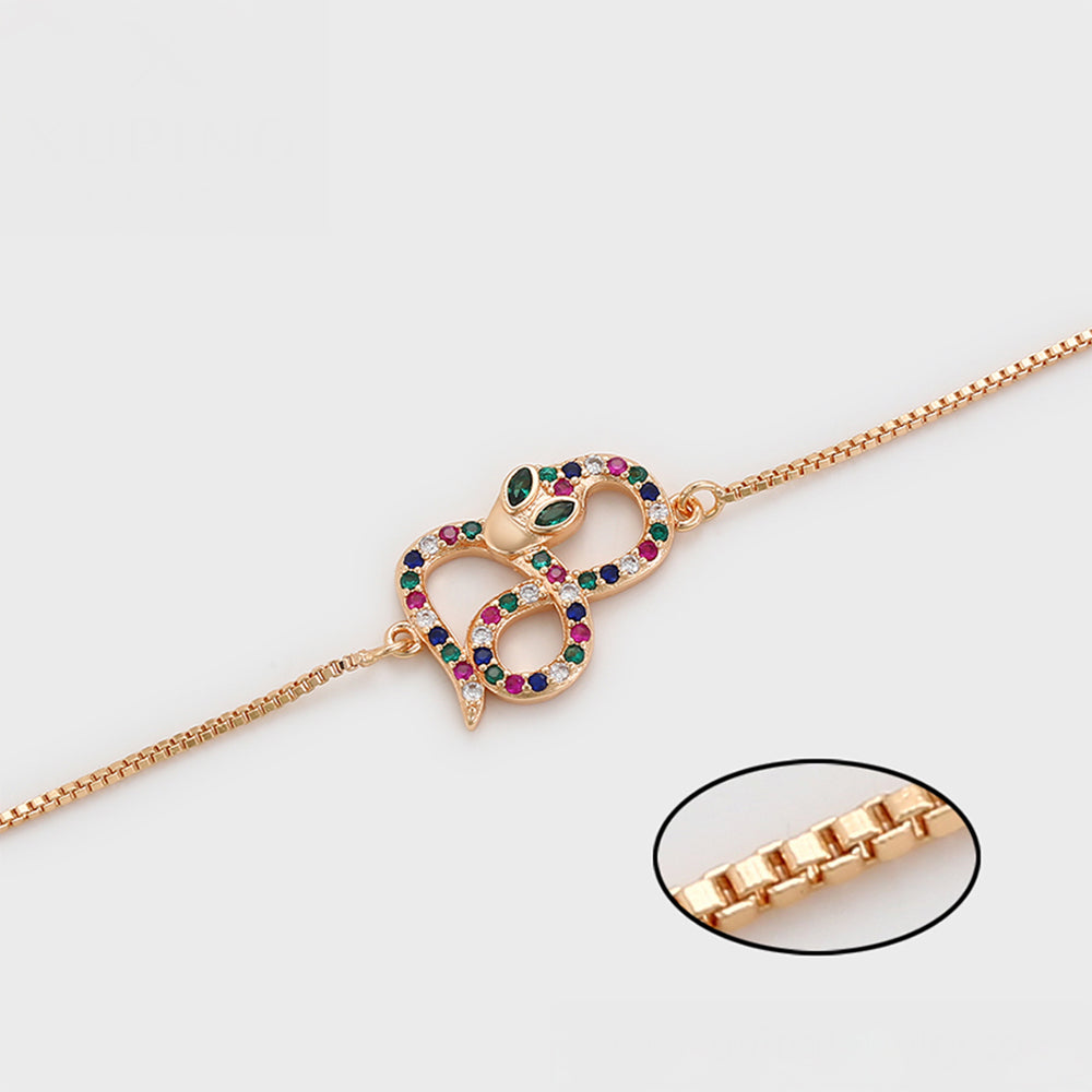 Armband aus goldplattiertesr Legierung mit rotem Emporia®-Kristall und grünem Emporia® Kristall