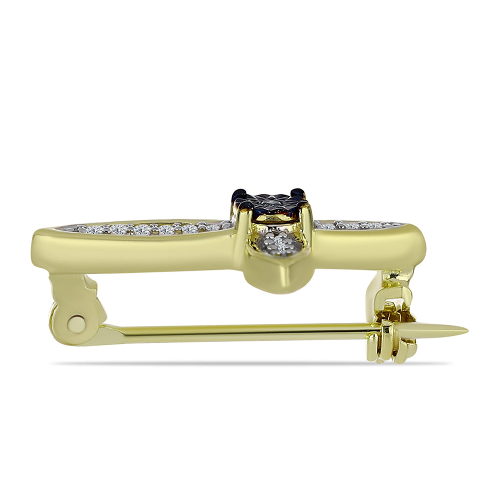 Goldplattierte Silberbrosche mit blauem Diamant und weißem Topas