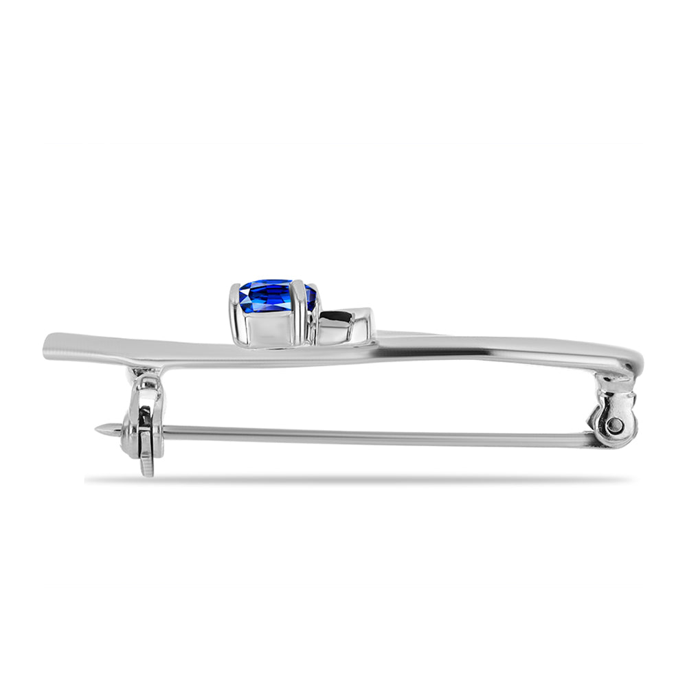 Silberbrosche mit australischem blauem Saphir und weißem Topas