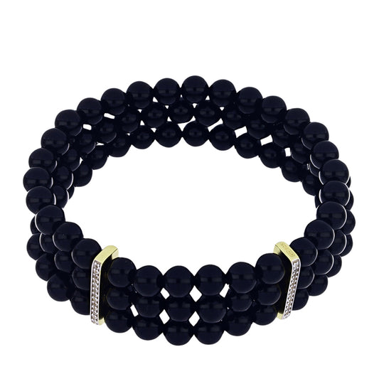 Goldplattiertes Silberarmband mit schwarzem Onyx aus Suwar und weißem Topas