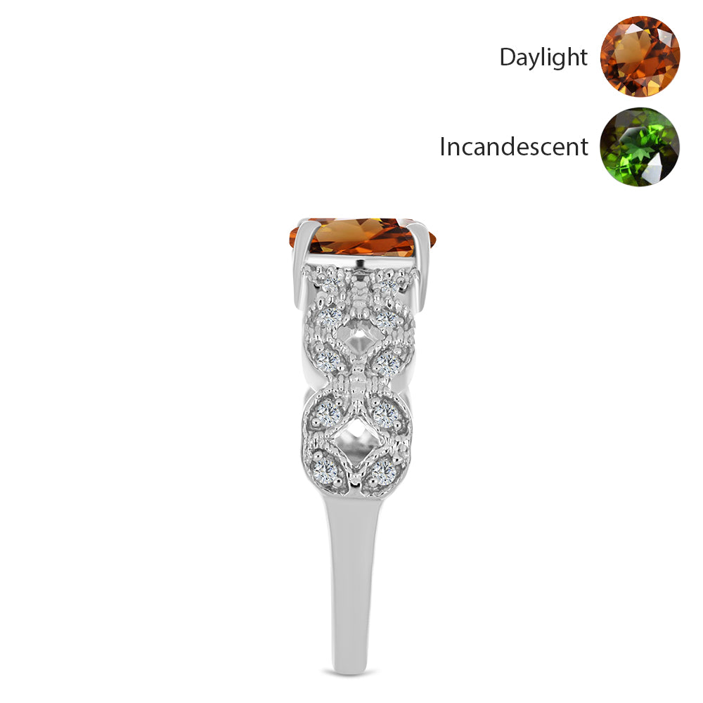 Silberring mit zertifiziertem laborgezüchteten Zultanit aus Anatolien und weißem Topas