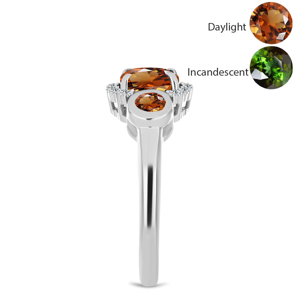 Silberring mit zertifiziertem laborgezüchteten Zultanit aus Anatolien und weißem Topas