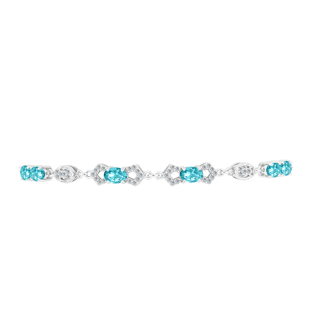 Silberarmband mit Paraiba Quarz und weißem Topas
