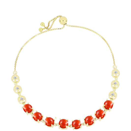 Goldplattiertes Silberarmband mit roter Schwammkoralle und weißem Topas
