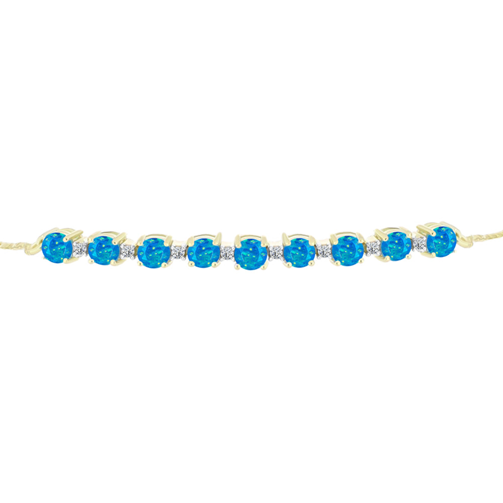 Goldplattiertes Silberarmband mit äthiopischem Paraiba-Blauopal und weißem Topas