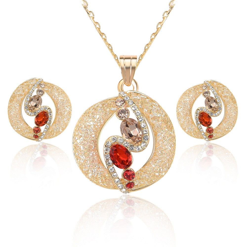 Schmuckgarnitur aus aus goldplattierter Legierung mit weißem Emporia® Kristall