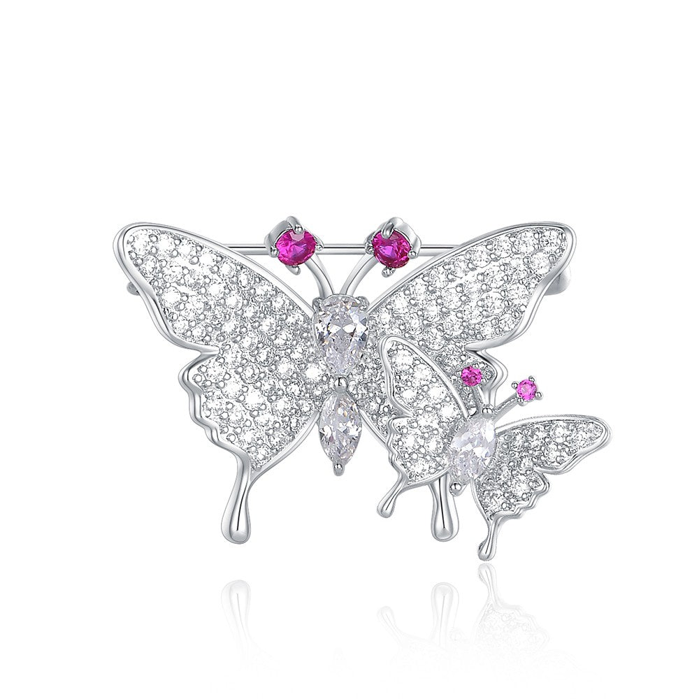 Brosche aus goldplattierter Legierung mit weißem Emporia® Kristall