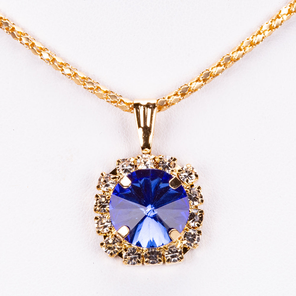 Schmuckgarnitur aus aus goldplattierter Legierung mit blauem Emporia®-Kristall