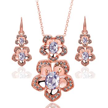 Schmuckgarnitur aus aus goldplattierter Legierung mit weißem Emporia® Kristall