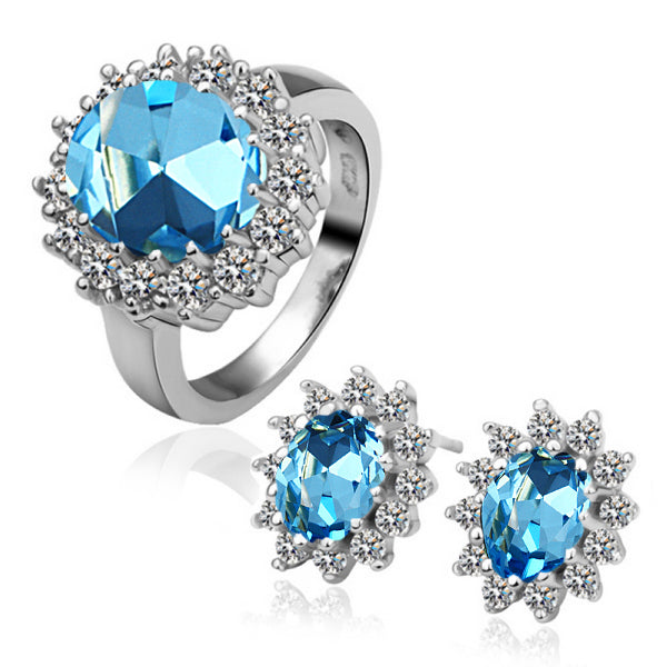 Schmuckgarnitur aus aus goldplattierter Legierung mit blauem Emporia®-Kristall