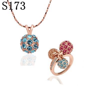 Schmuckgarnitur aus aus goldplattierter Legierung mit blauem Emporia®-Kristall und rotem Emporia®-Kristall