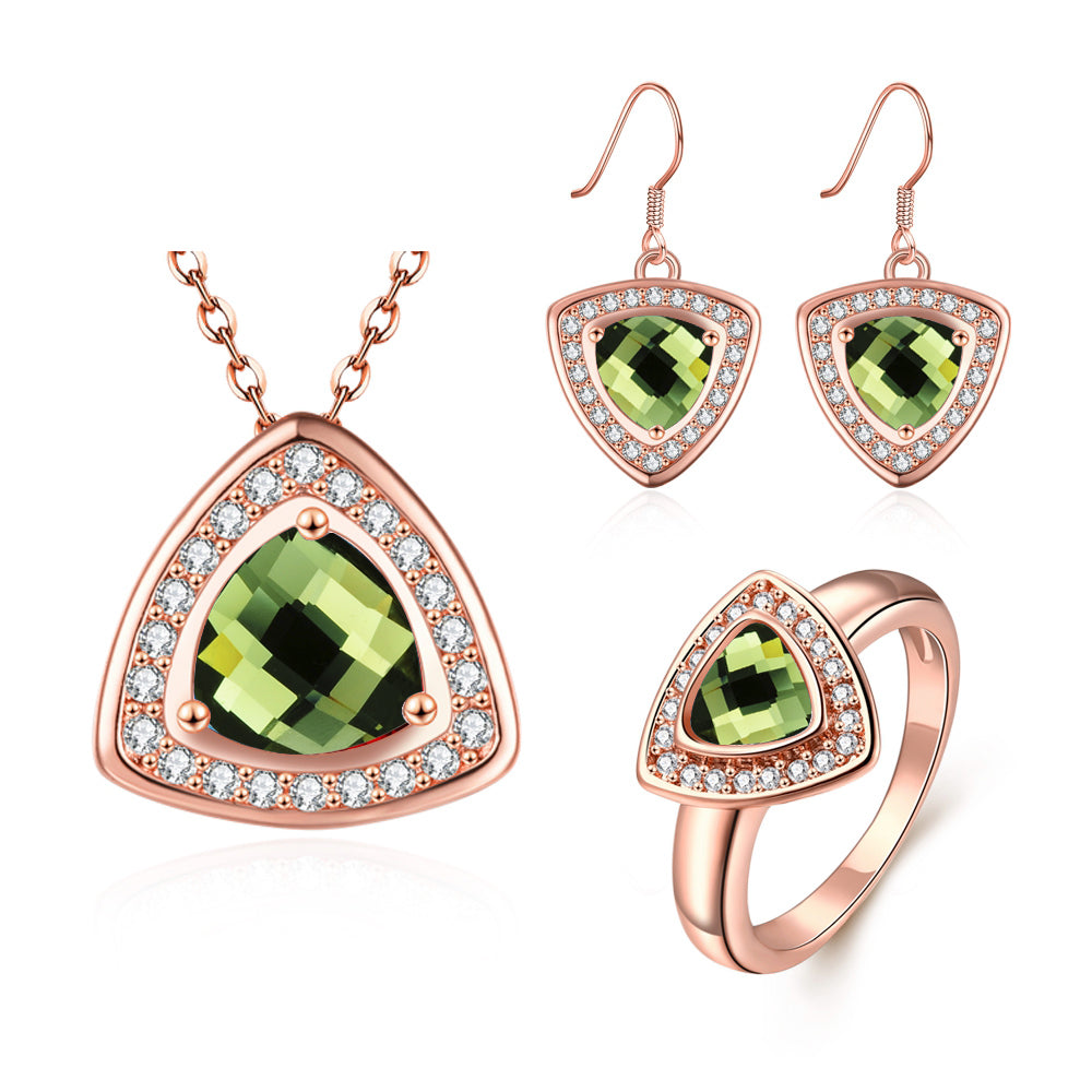 Schmuckgarnitur aus aus goldplattierter Legierung mit grünem Emporia® Kristall