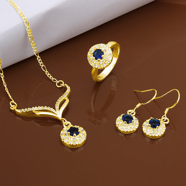 Schmuckgarnitur aus aus goldplattierter Legierung mit blauem Emporia®-Kristall