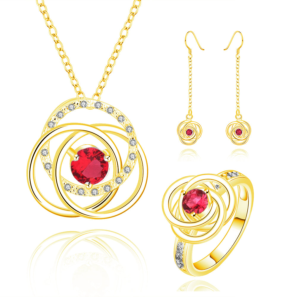Schmuckgarnitur aus aus goldplattierter Legierung mit rotem Emporia®-Kristall