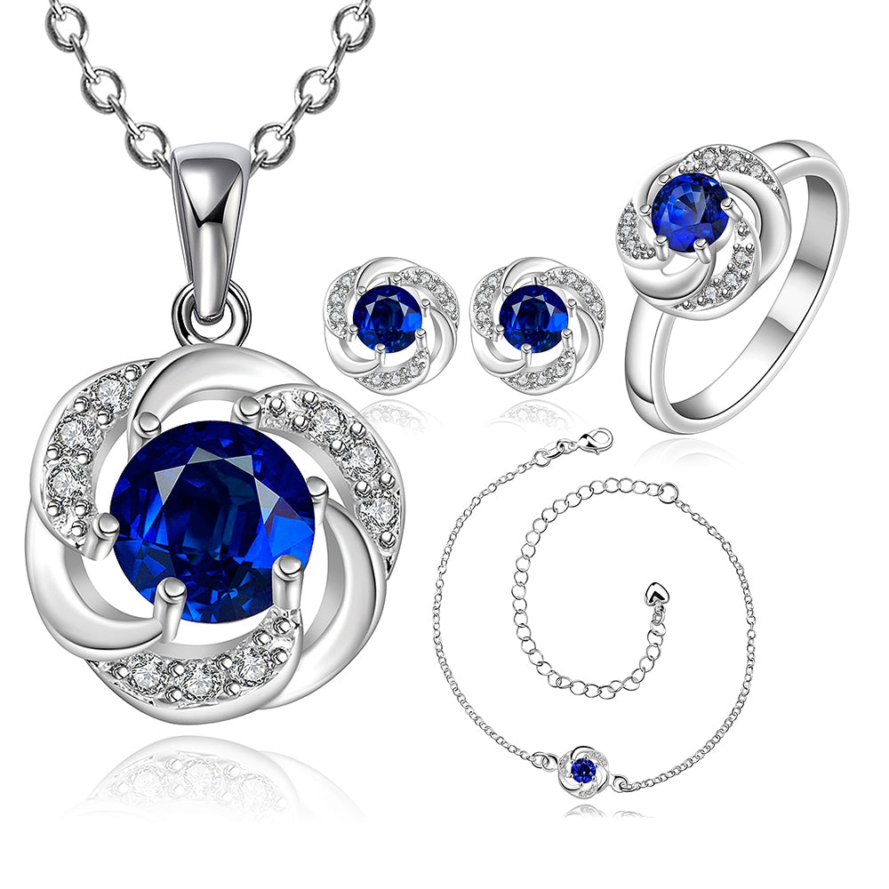 Schmuckgarnitur aus aus goldplattierter Legierung mit blauem Emporia®-Kristall