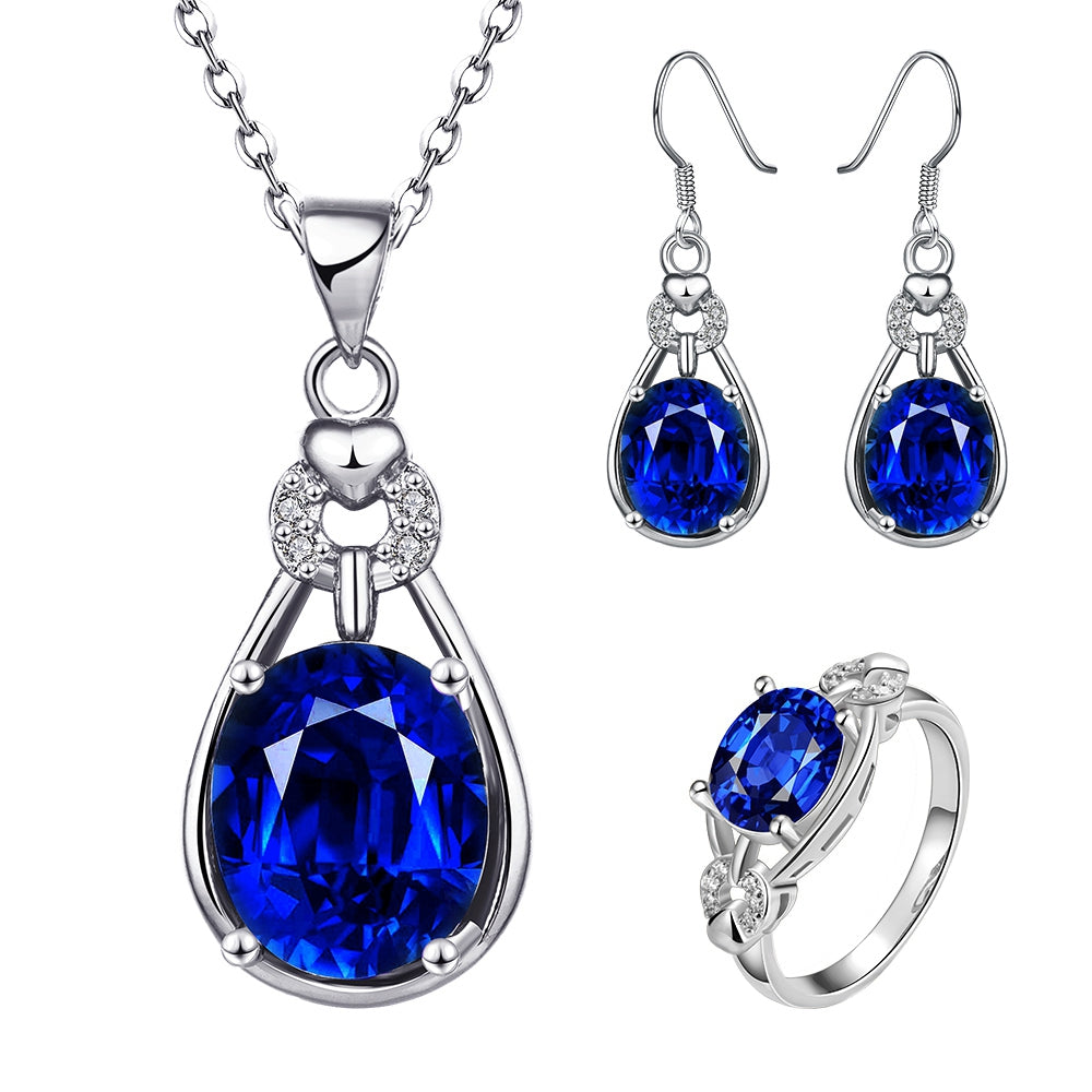 Schmuckgarnitur aus aus goldplattierter Legierung mit blauem Emporia®-Kristall