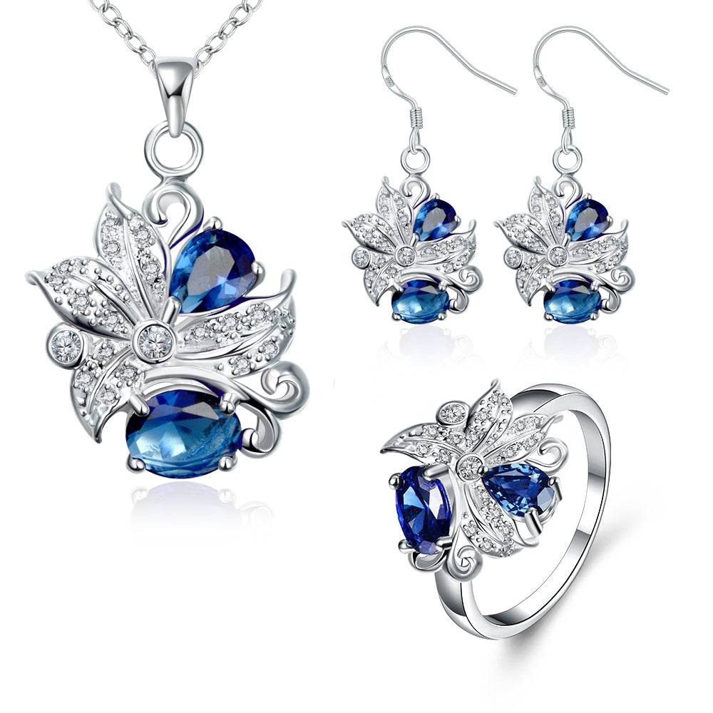 Schmuckgarnitur aus aus goldplattierter Legierung mit blauem Emporia®-Kristall