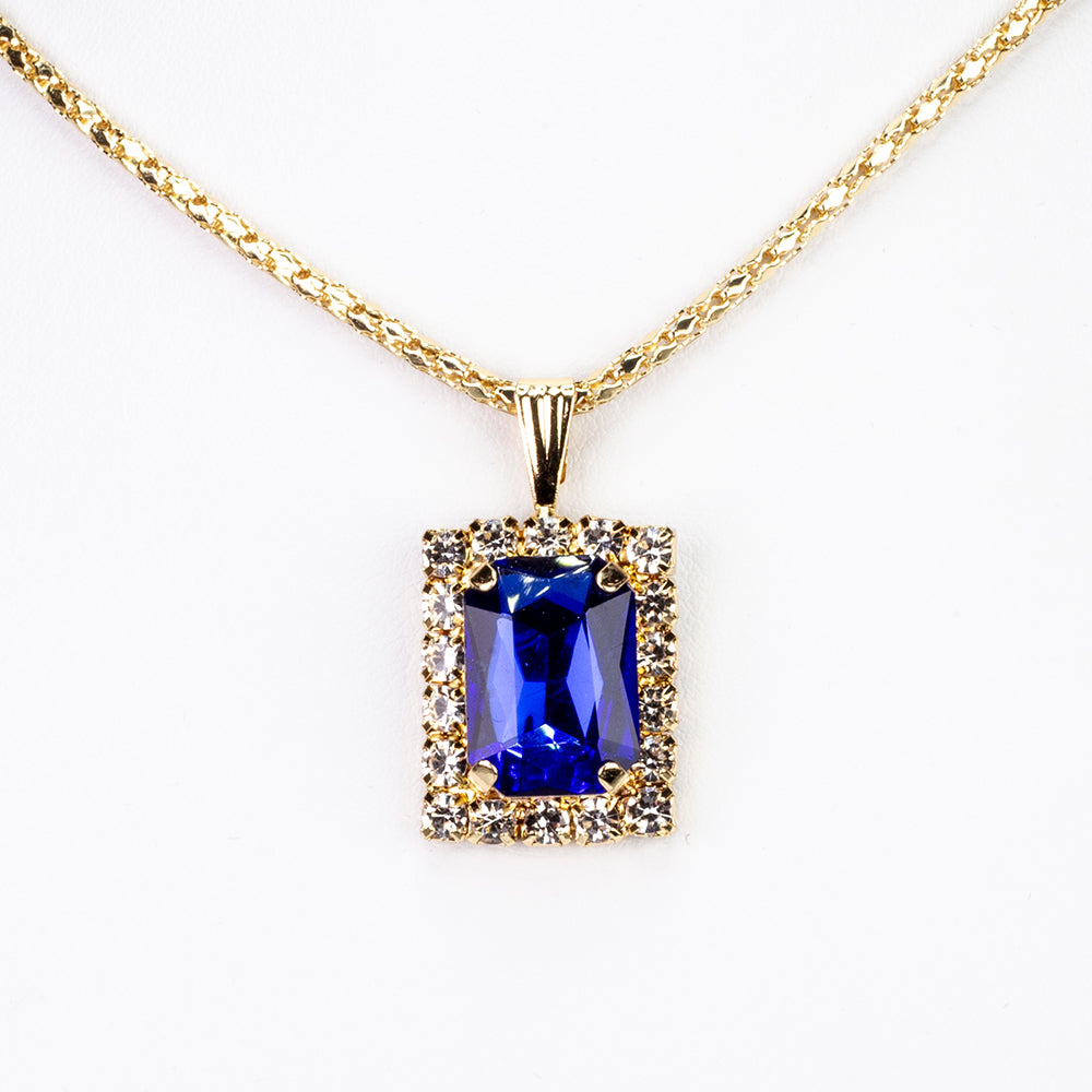Schmuckgarnitur aus aus goldplattierter Legierung mit blauem Emporia®-Kristall und weißem Emporia® Kristall