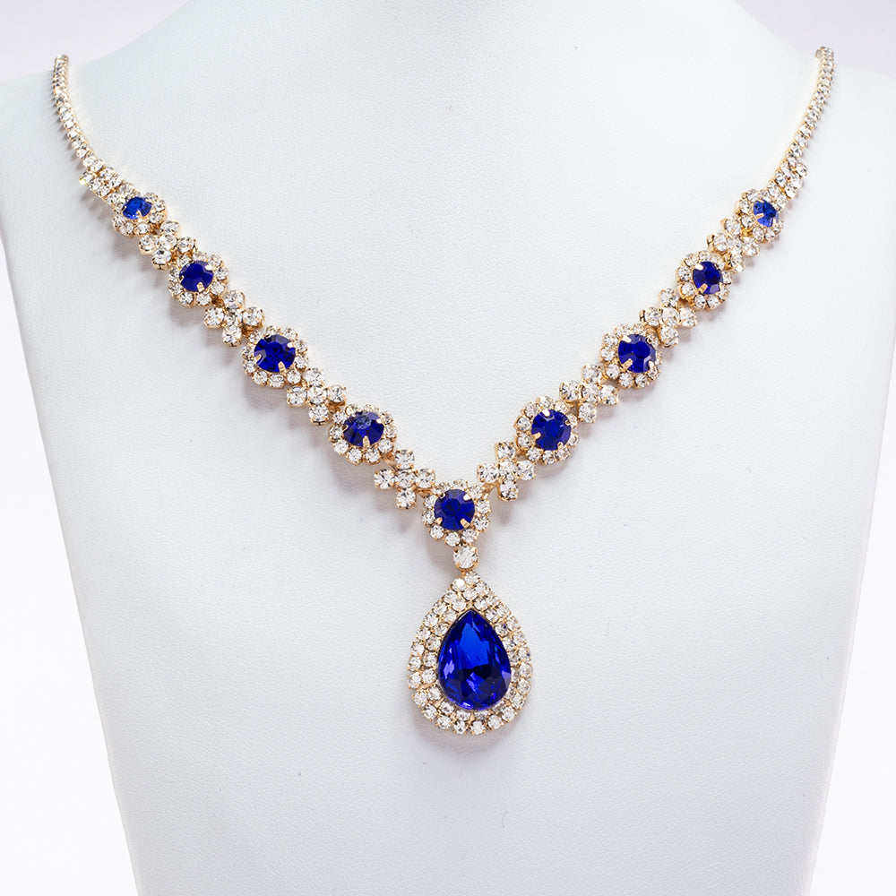 Schmuckgarnitur aus aus goldplattierter Legierung mit blauem Emporia®-Kristall und weißem Emporia® Kristall